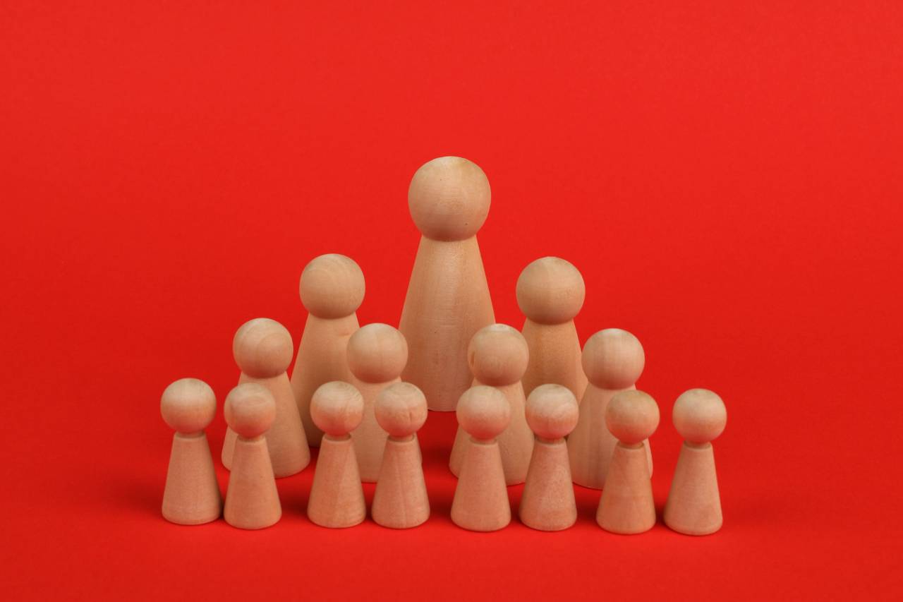 Figures forming a team